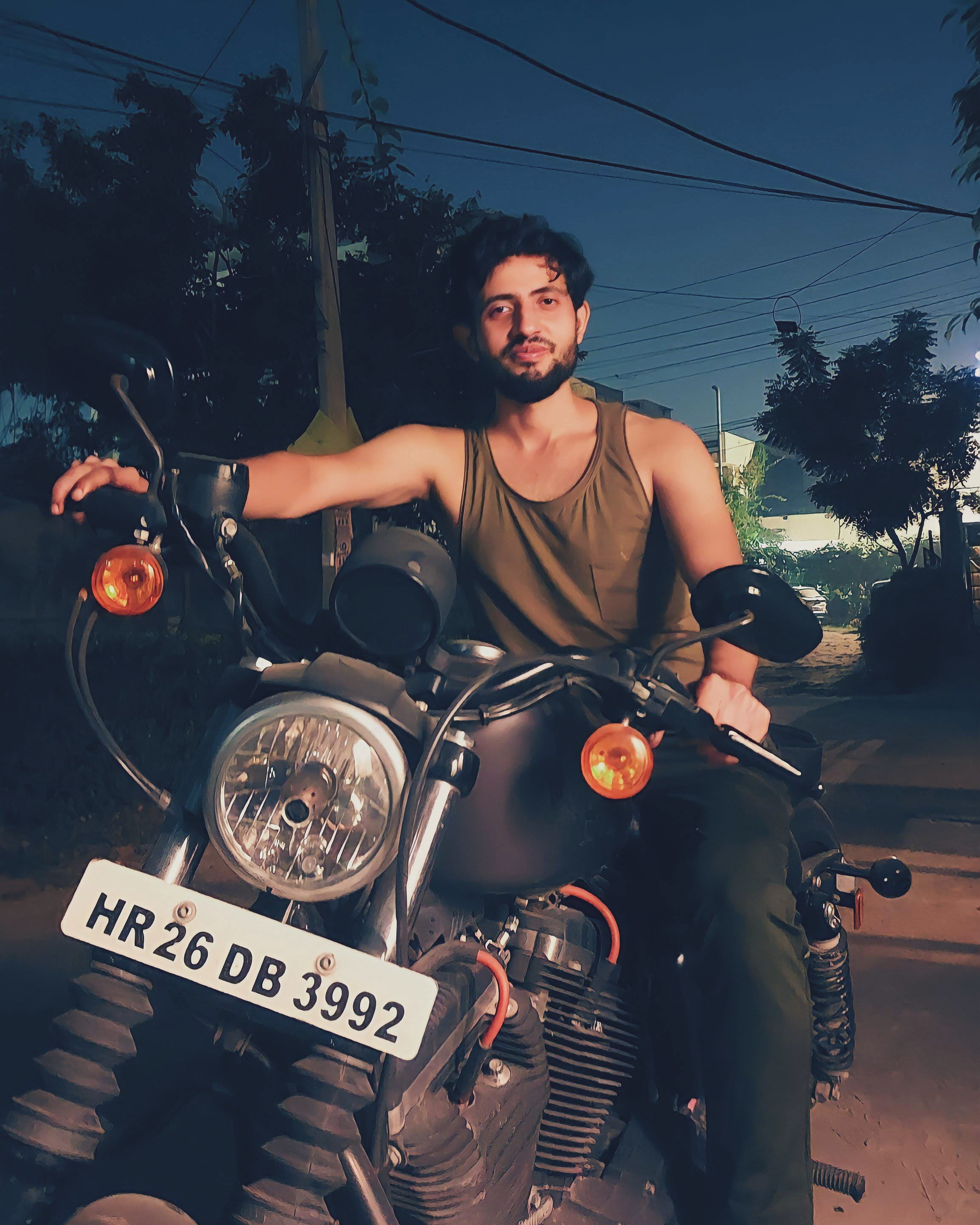 Moksh and his motorcycle.